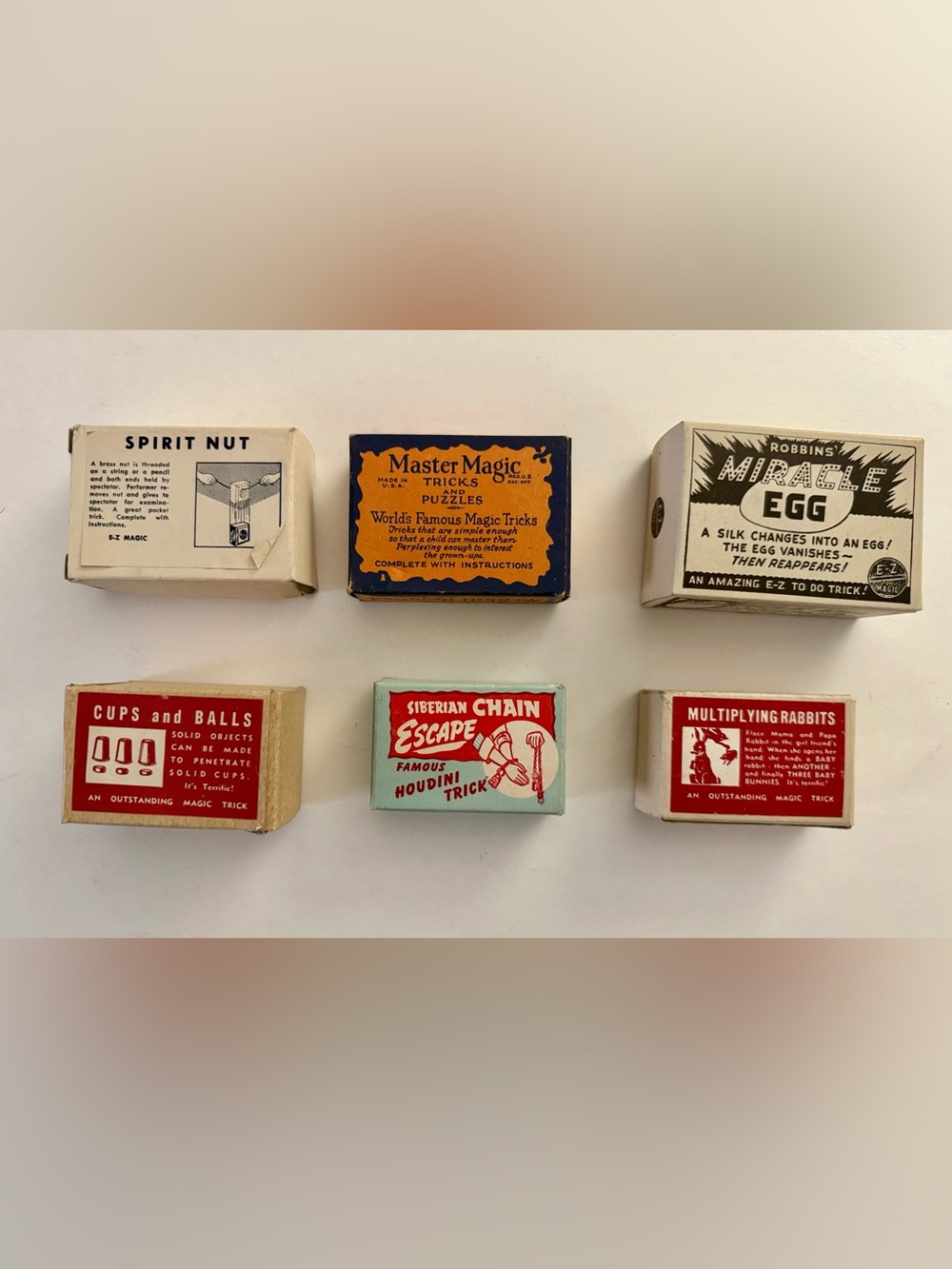 VINTAGE 6 TINY BOXES OF MAGIC TRICKS